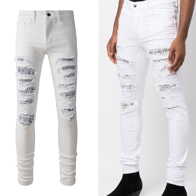 Weiße, zerrissene Jeans mit Cashewblüten-Patch