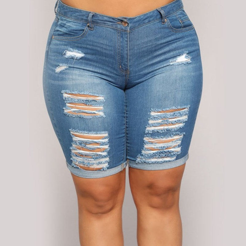 Summer Plus Size Ripped Jeans for Women - Trendy and comfortable denim pants.