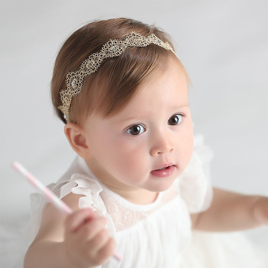 Petite Blossom Dreams: Stylish Baby Hair Band from Eternal Gleams