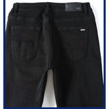 Midnight Style: Men's Black Patch Pleated Jeans from Eternal Gleams