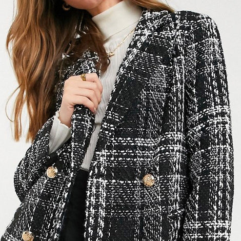 Eternal Gleams chic black and white plaid blazer for formal and professional wear.