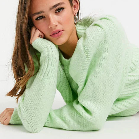 Eternal Gleams cozy mint green sweater, perfect for cool weather.